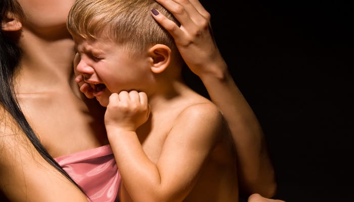 How do I calm my child during a temper tantrum?